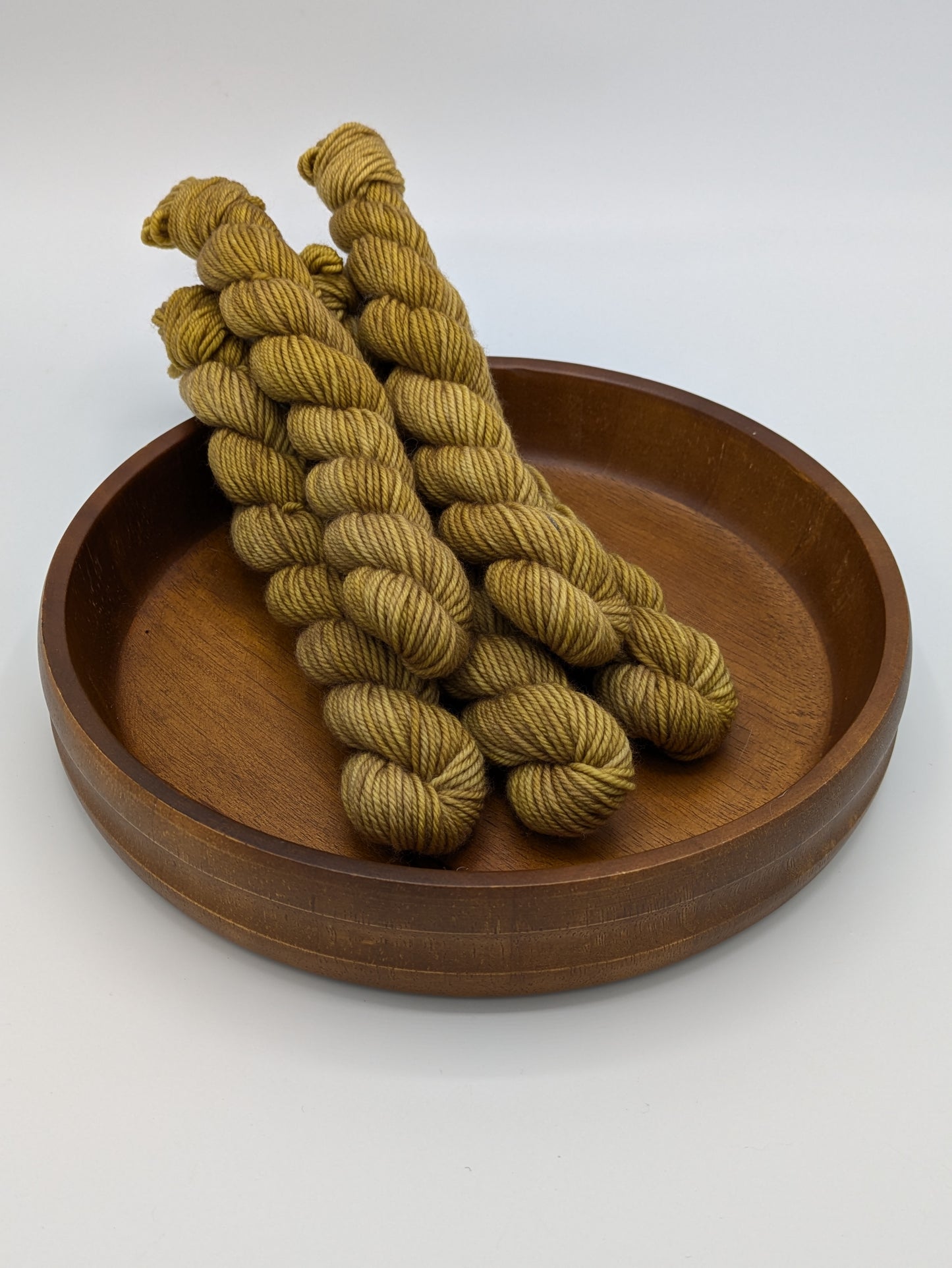 Colonel Mustard Yarn in 20 gram DK weight mini skein, showcasing vibrant mustard yellow color