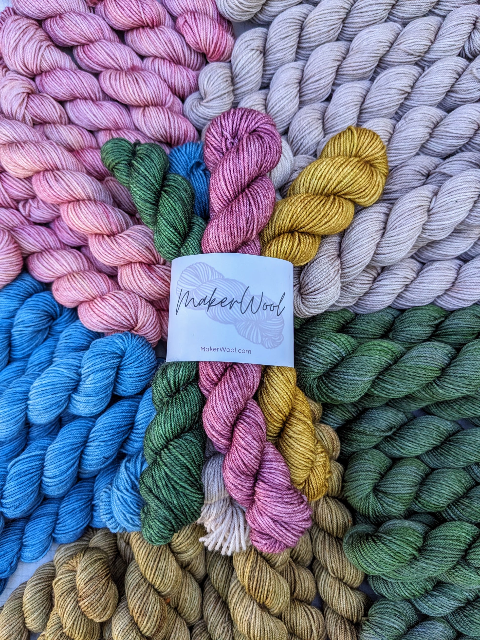 Spring Garden mini skein yarn set, showing various hand-dyed and vibrant colors