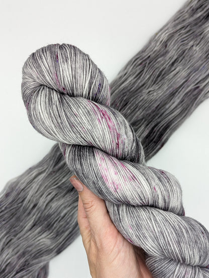 Lightning Yarn in fingering weight, showcasing vibrant lightning-inspired hues