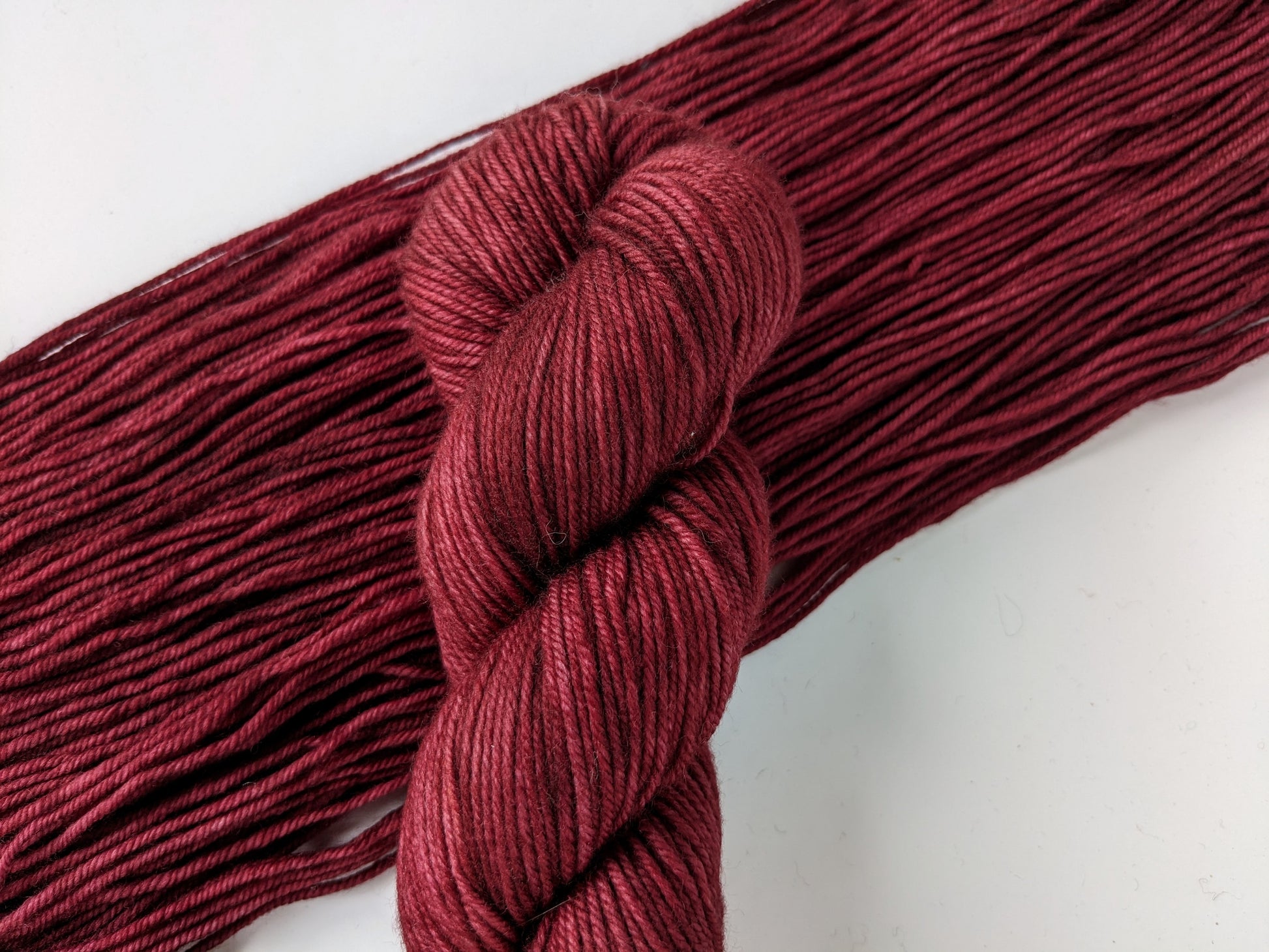 Merlot Yarn in DK weight, showcasing deep wine color