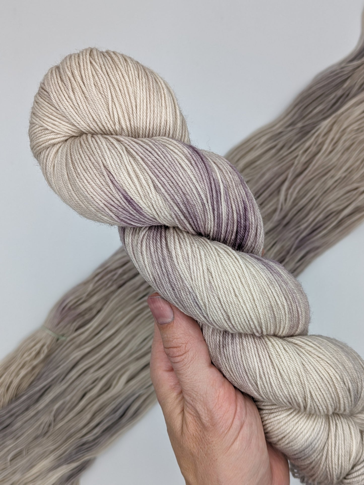 Natural Beauty Yarn in fingering weight, showcasing natural hues